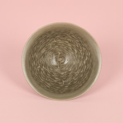 Lot 40 - A small Chinese Yaozhou celadon 'fish' moulded bowl, Northern Song dynasty