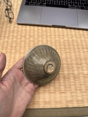 Lot 40 - A small Chinese Yaozhou celadon 'fish' moulded bowl, Northern Song dynasty