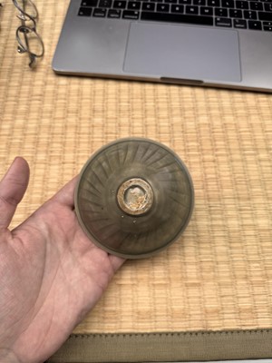 Lot 40 - A small Chinese Yaozhou celadon 'fish' moulded bowl, Northern Song dynasty