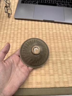 Lot 40 - A small Chinese Yaozhou celadon 'fish' moulded bowl, Northern Song dynasty