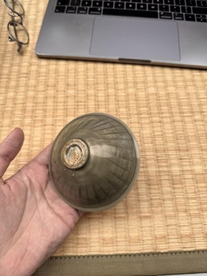 Lot 40 - A small Chinese Yaozhou celadon 'fish' moulded bowl, Northern Song dynasty