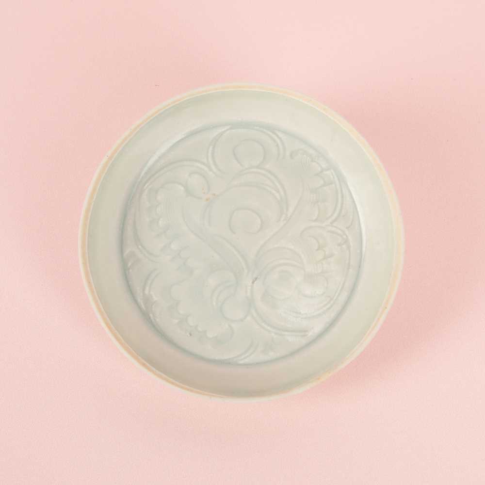 Lot 467 - A small Chinese Qingbai 'lotus' carved dish, Southern Song dynasty