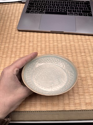 Lot 467 - A small Chinese Qingbai 'lotus' carved dish, Southern Song dynasty