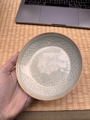 Lot 467 - A small Chinese Qingbai 'lotus' carved dish, Southern Song dynasty
