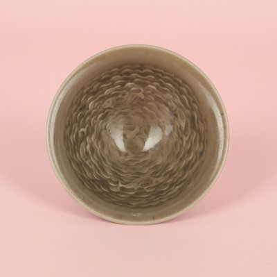 Lot 22 - A small Chinese Yaozhou celadon 'fish' moulded bowl, Northern Song dynasty