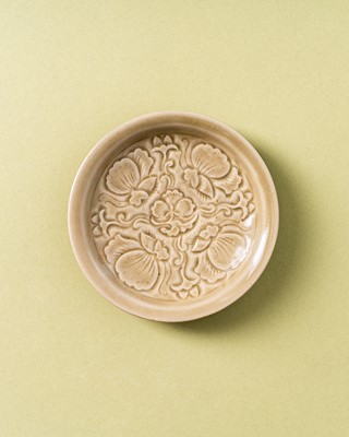 Lot 42 - A rare Chinese Yaozhou celadon 'butterfly' moulded dish, Song dynasty