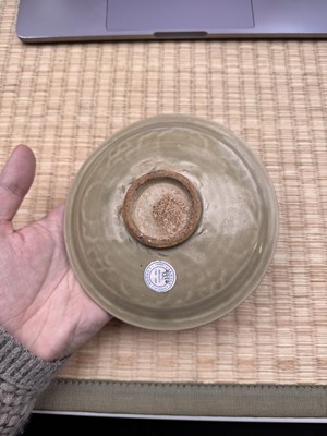 Lot 42 - A rare Chinese Yaozhou celadon 'butterfly' moulded dish, Song dynasty