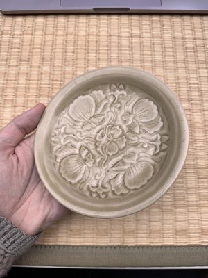 Lot 42 - A rare Chinese Yaozhou celadon 'butterfly' moulded dish, Song dynasty