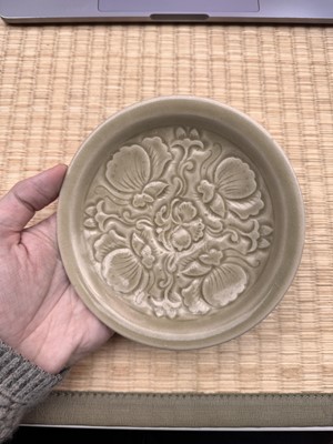 Lot 42 - A rare Chinese Yaozhou celadon 'butterfly' moulded dish, Song dynasty