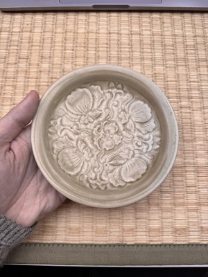 Lot 42 - A rare Chinese Yaozhou celadon 'butterfly' moulded dish, Song dynasty