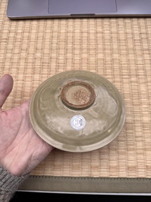 Lot 42 - A rare Chinese Yaozhou celadon 'butterfly' moulded dish, Song dynasty