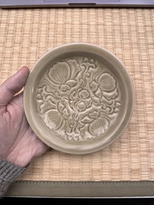 Lot 42 - A rare Chinese Yaozhou celadon 'butterfly' moulded dish, Song dynasty