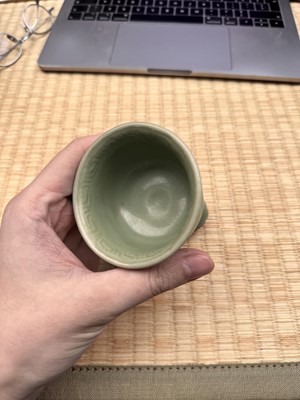 Lot 1 - A Chinese Longquan celadon 'floral' carved stem cup, Yuan - Early Ming dynasty