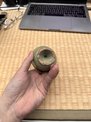 Lot 1 - A Chinese Longquan celadon 'floral' carved stem cup, Yuan - Early Ming dynasty