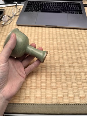 Lot 1 - A Chinese Longquan celadon 'floral' carved stem cup, Yuan - Early Ming dynasty