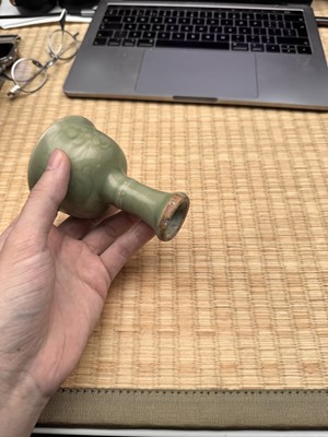Lot 1 - A Chinese Longquan celadon 'floral' carved stem cup, Yuan - Early Ming dynasty