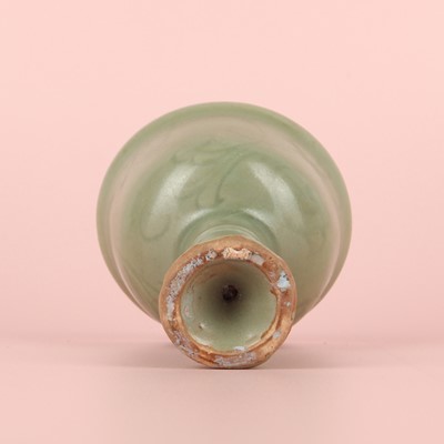 Lot 1 - A Chinese Longquan celadon 'floral' carved stem cup, Yuan - Early Ming dynasty