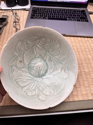 Lot 16 - A Chinese Qingbai 'peony' carved bowl, Southern Song dynasty