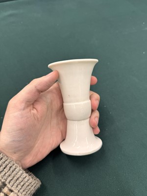 Lot 18 - A small rare Chinese Dehua beaker vase, Ming - Qing dynasty