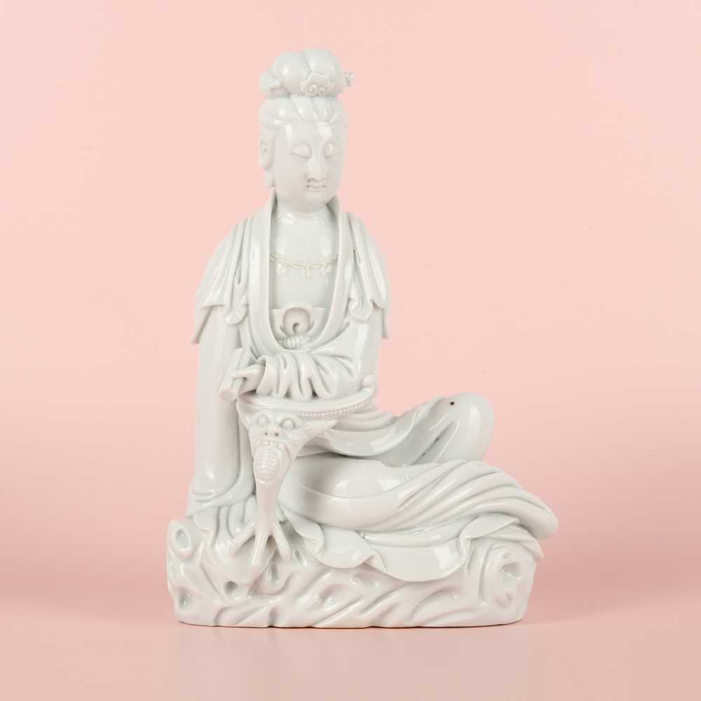 Lot 489 - A Chinese Dehua figure of Guanyin, Qing dynasty, 19th century