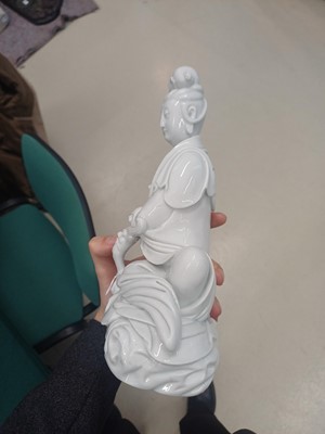 Lot 489 - A Chinese Dehua figure of Guanyin, Qing dynasty, 19th century