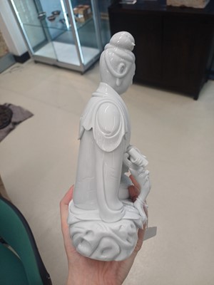 Lot 489 - A Chinese Dehua figure of Guanyin, Qing dynasty, 19th century