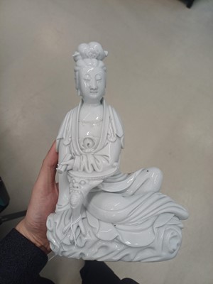 Lot 489 - A Chinese Dehua figure of Guanyin, Qing dynasty, 19th century