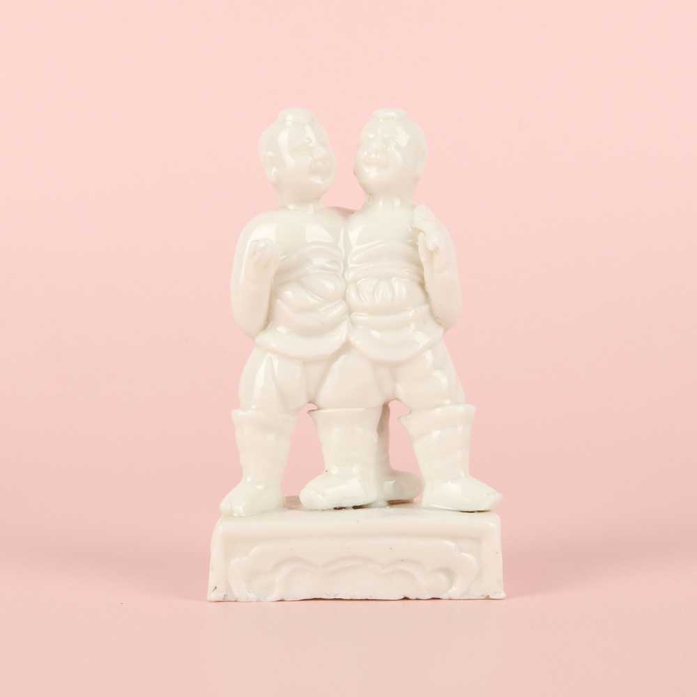 Lot 3 - A fine Chinese Dehua 'hehe erxian' group, Qing dynasty, Kangxi period