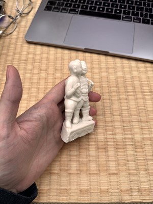 Lot 3 - A fine Chinese Dehua 'hehe erxian' group, Qing dynasty, Kangxi period