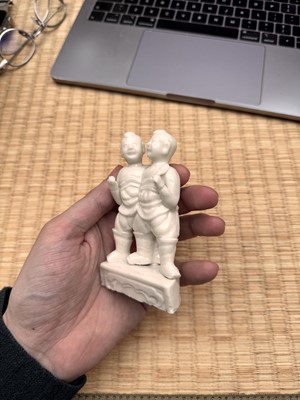 Lot 3 - A fine Chinese Dehua 'hehe erxian' group, Qing dynasty, Kangxi period