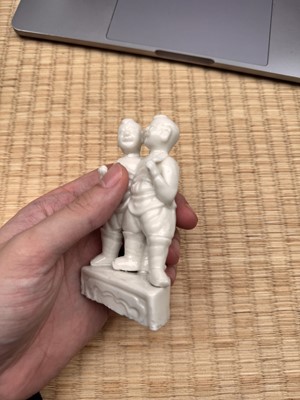 Lot 3 - A fine Chinese Dehua 'hehe erxian' group, Qing dynasty, Kangxi period