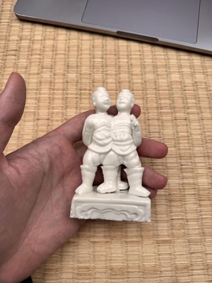 Lot 3 - A fine Chinese Dehua 'hehe erxian' group, Qing dynasty, Kangxi period