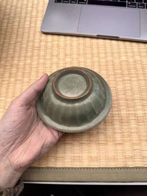 Lot 2 - A Chinese Longquan celadon 'twin fish' moulded dish, Song dynasty