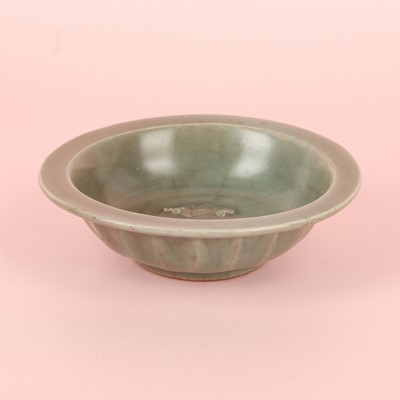 Lot 2 - A Chinese Longquan celadon 'twin fish' moulded dish, Song dynasty
