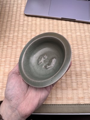 Lot 2 - A Chinese Longquan celadon 'twin fish' moulded dish, Song dynasty
