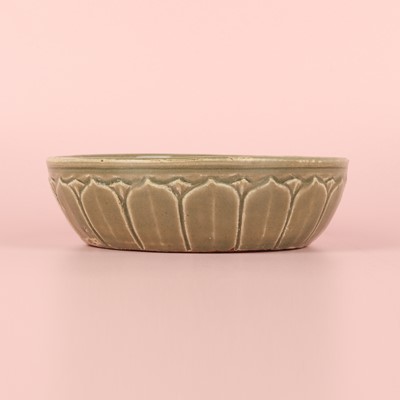 Lot 11 - A Chinese Yue celadon 'lotus' washer, Song dynasty