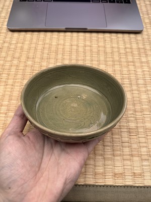 Lot 11 - A Chinese Yue celadon 'lotus' washer, Song dynasty