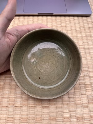 Lot 11 - A Chinese Yue celadon 'lotus' washer, Song dynasty
