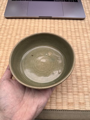 Lot 11 - A Chinese Yue celadon 'lotus' washer, Song dynasty