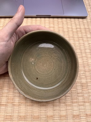 Lot 11 - A Chinese Yue celadon 'lotus' washer, Song dynasty