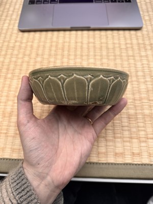 Lot 11 - A Chinese Yue celadon 'lotus' washer, Song dynasty
