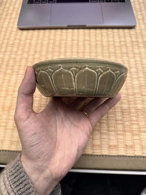 Lot 11 - A Chinese Yue celadon 'lotus' washer, Song dynasty