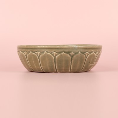 Lot 11 - A Chinese Yue celadon 'lotus' washer, Song dynasty