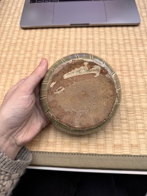 Lot 11 - A Chinese Yue celadon 'lotus' washer, Song dynasty