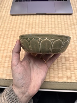 Lot 11 - A Chinese Yue celadon 'lotus' washer, Song dynasty