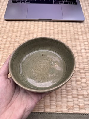 Lot 11 - A Chinese Yue celadon 'lotus' washer, Song dynasty