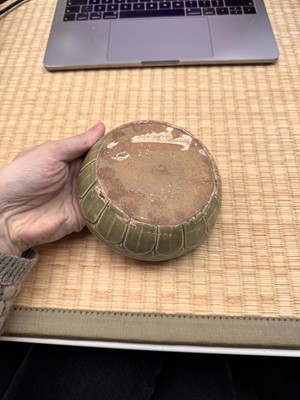 Lot 11 - A Chinese Yue celadon 'lotus' washer, Song dynasty