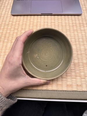 Lot 11 - A Chinese Yue celadon 'lotus' washer, Song dynasty