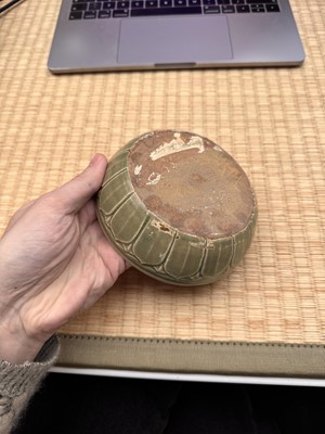 Lot 11 - A Chinese Yue celadon 'lotus' washer, Song dynasty