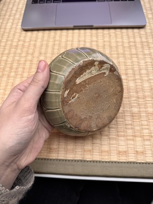 Lot 11 - A Chinese Yue celadon 'lotus' washer, Song dynasty